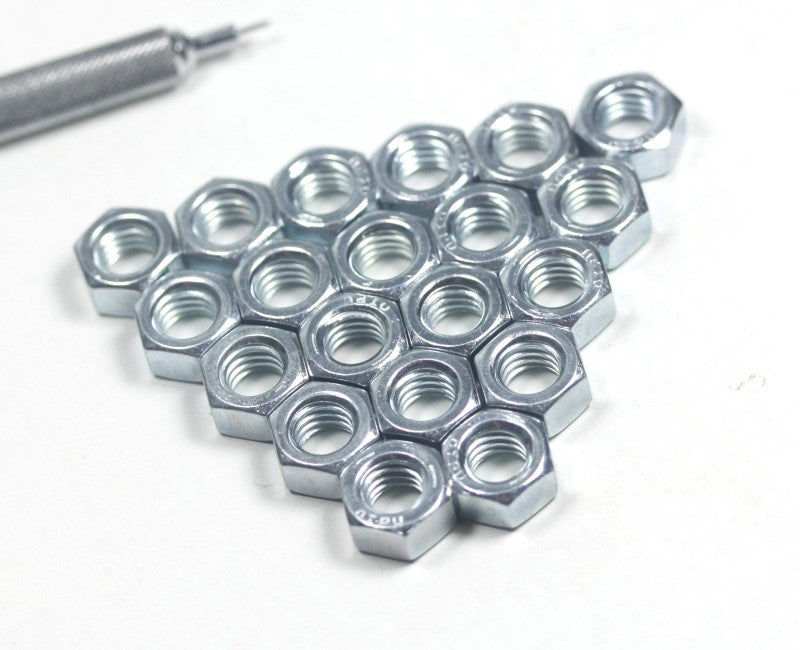 quantity of 20 5/16" nuts with mechanical pencil for scale