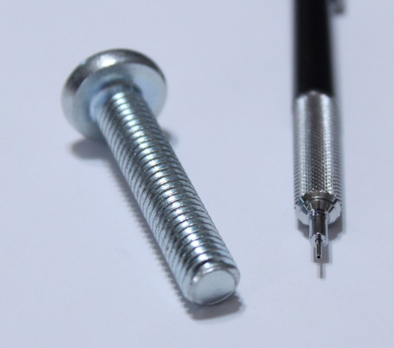 3/8" x 2" screw shown with mechanical pencil for scale