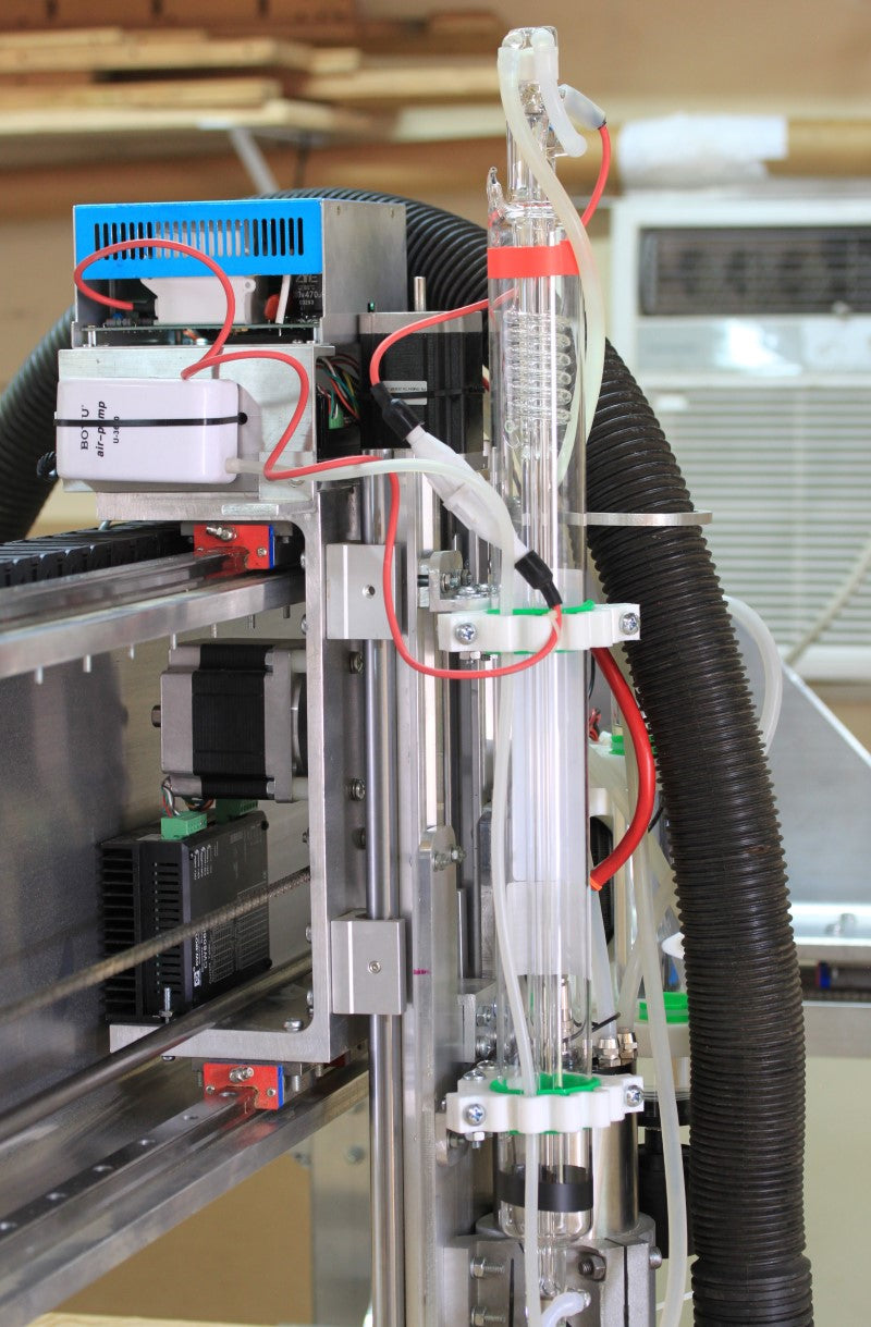 Fabricator Pro CNC Machine view of the top of the Z axis and the CO2 laser power supply and laser tube along with the Y axis carriage