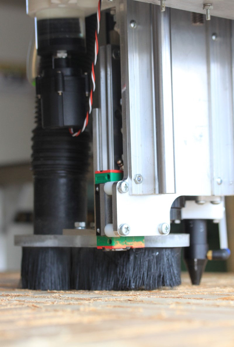 Fabricator Pro CNC Router view of the back right side of the z axis assembly showing the dust hose and the dust shoe