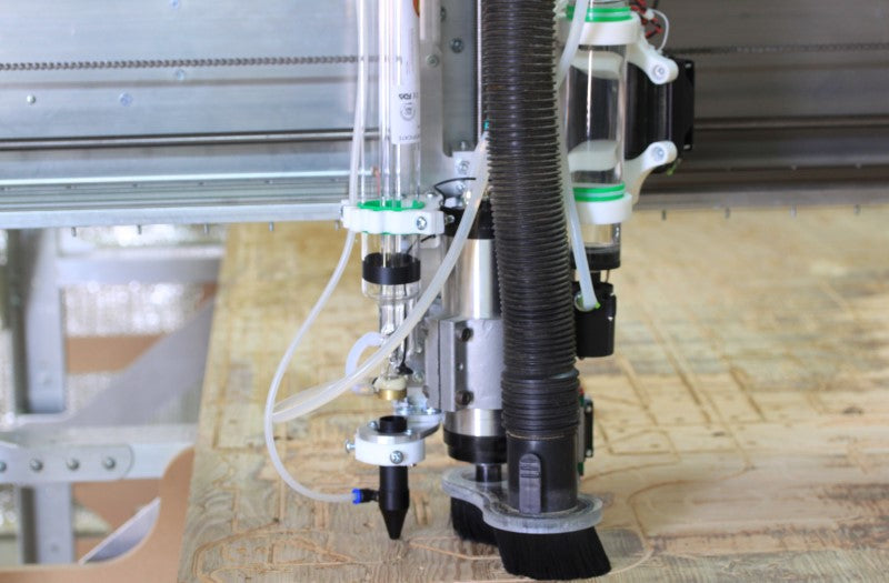 Fabricator Pro CNC Router view from above of the z axis assembly of the CO2 laser components and the spindle and spindle water cooling pump and radiator and fan.