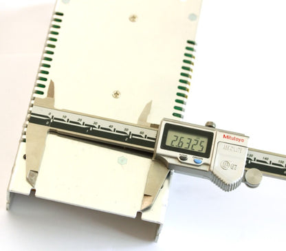 Mount hole spacing on the bottom of the 24 volt 10 amp power supply measuring 2.63 inches