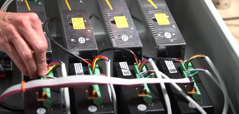 The drivers and power supplies inside of the cnc electronics system cabinet