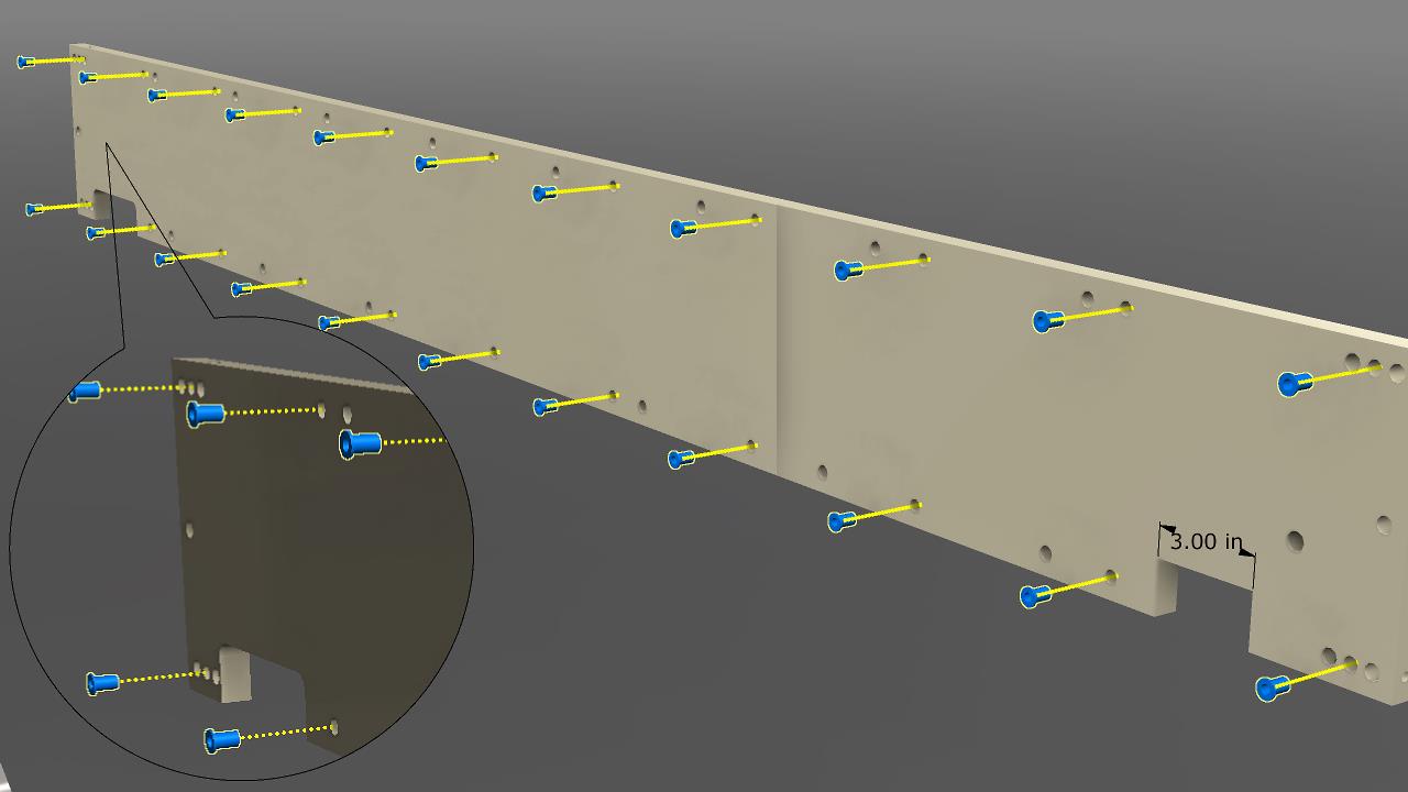 Install nut inserts on the gantry front